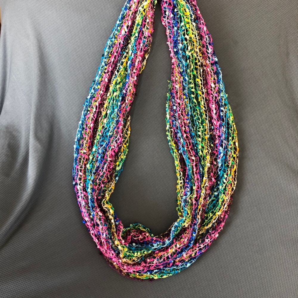Bright Colored ladder yarn cowl style scarf.